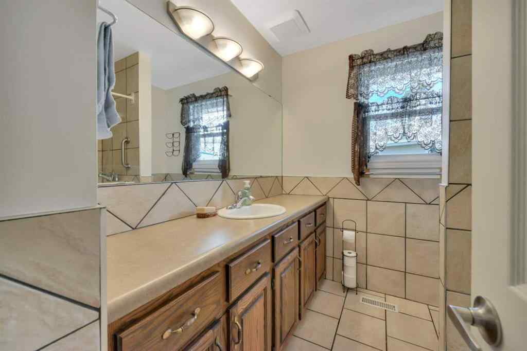 MLS® A2256637 - 25 Odstone Green  in Oriole Park Red Deer, Residential