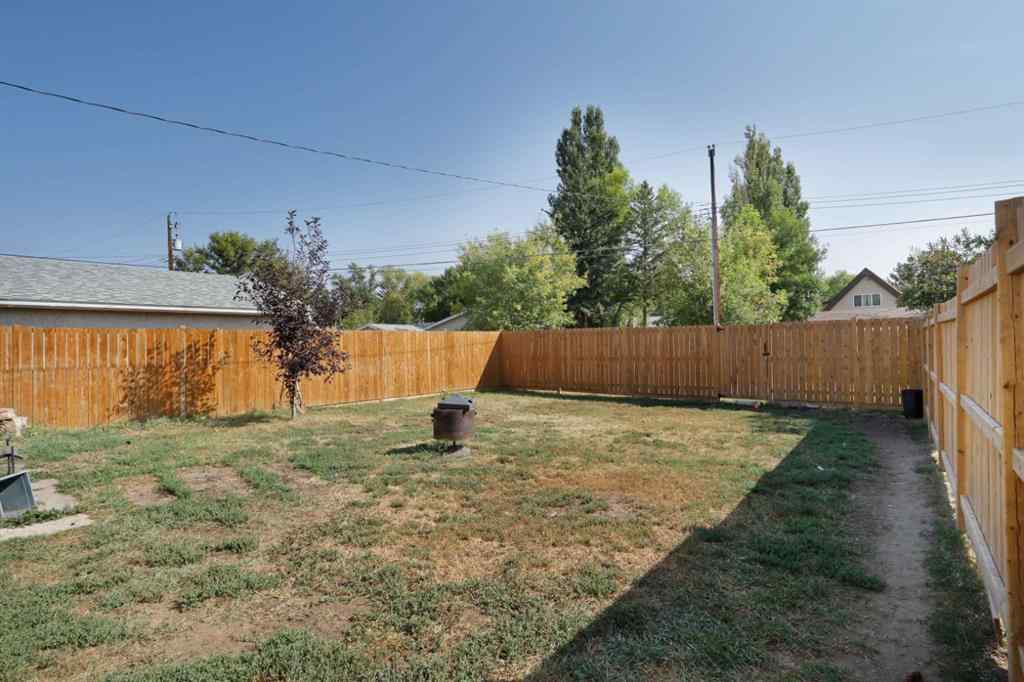 MLS® A2256648 - Unit #A 1008 2 Avenue W in West End Brooks, Residential