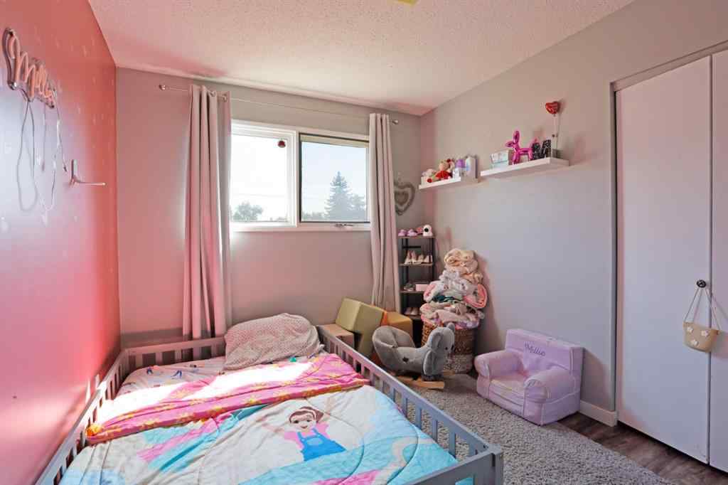 MLS® A2256648 - Unit #A 1008 2 Avenue W in West End Brooks, Residential