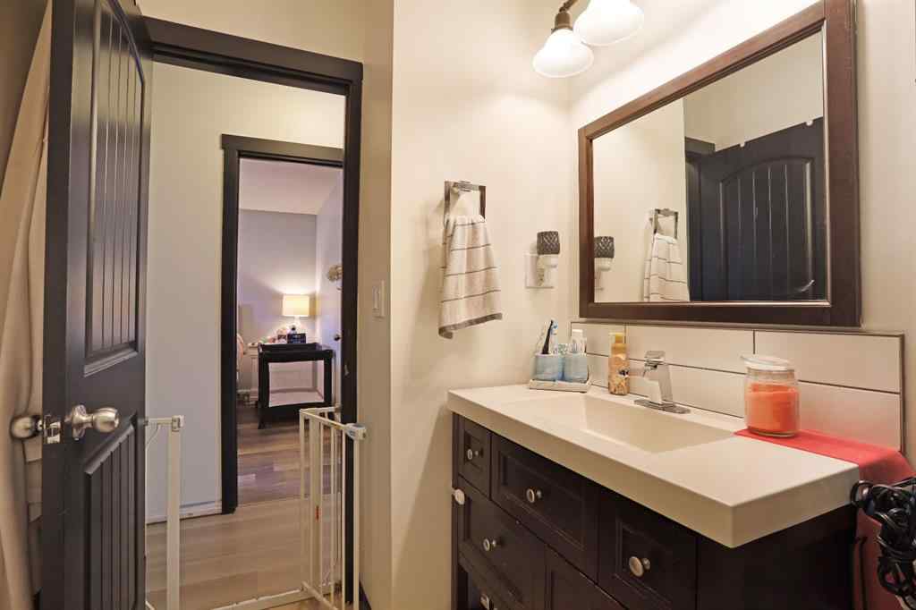 MLS® A2256648 - Unit #A 1008 2 Avenue W in West End Brooks, Residential