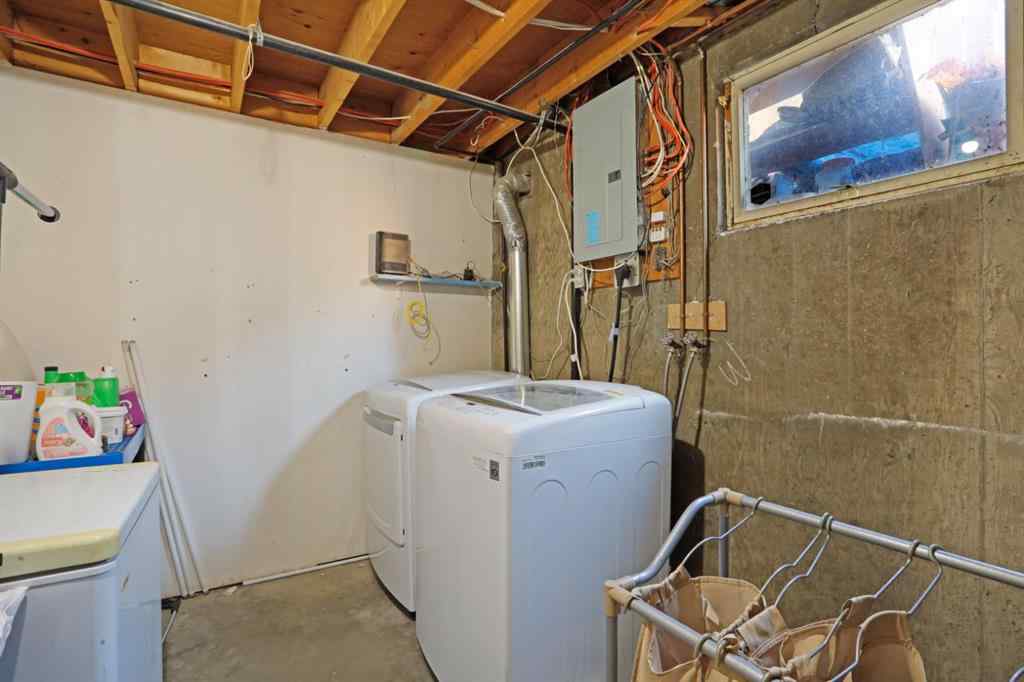 MLS® A2256648 - Unit #A 1008 2 Avenue W in West End Brooks, Residential