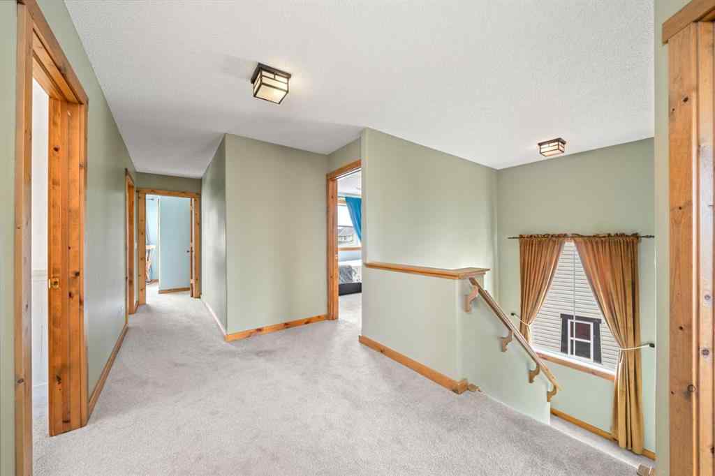 MLS® A2256658 - 122 Hidden Creek Heights NW in Hidden Valley Calgary, Residential