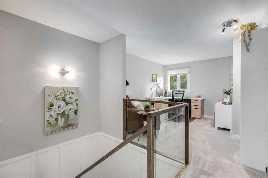 MLS® A2256659 - 24 Coachway Green SW in Coach Hill Calgary, Residential