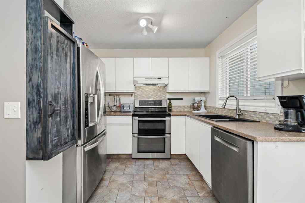 MLS® A2256670 - 10884 Hidden Valley Drive NW in Hidden Valley Calgary, Residential