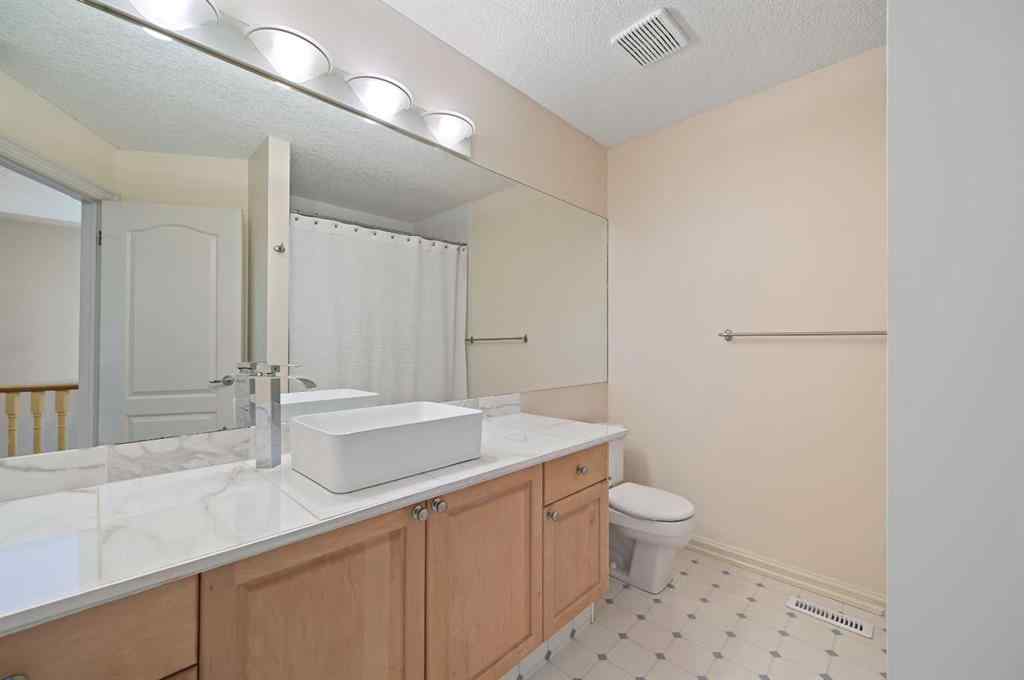 MLS® A2256672 - 41 Strathridge Crescent SW in Strathcona Park Calgary, Residential