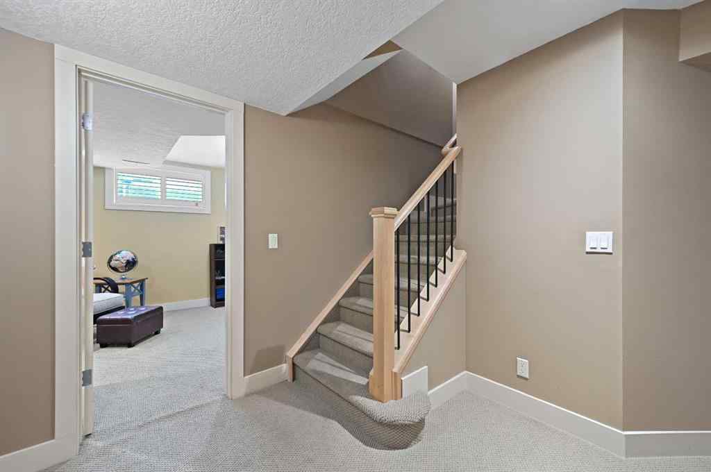 MLS® A2256672 - 41 Strathridge Crescent SW in Strathcona Park Calgary, Residential