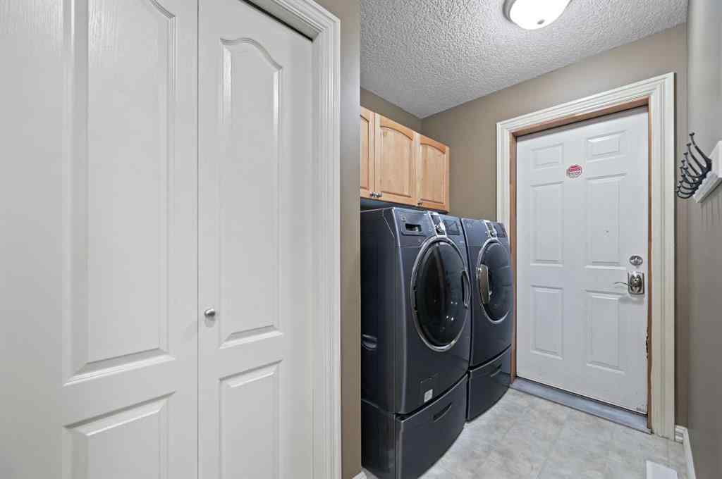 MLS® A2256672 - 41 Strathridge Crescent SW in Strathcona Park Calgary, Residential