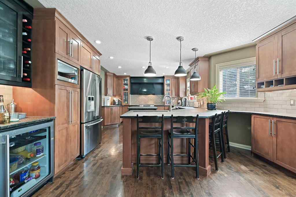MLS® A2256672 - 41 Strathridge Crescent SW in Strathcona Park Calgary, Residential