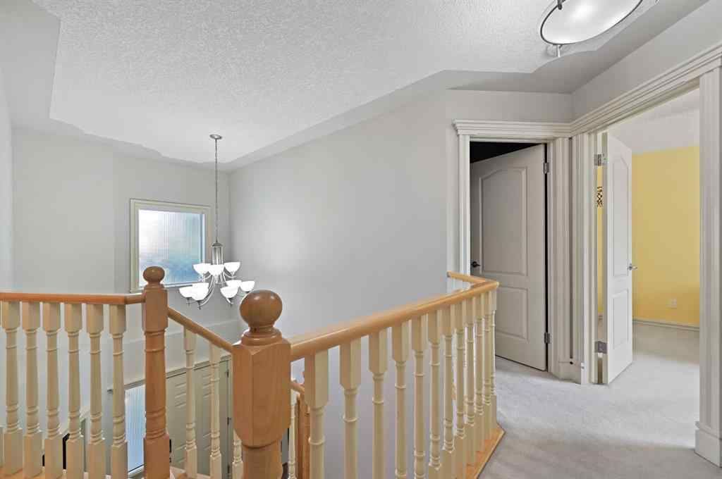 MLS® A2256672 - 41 Strathridge Crescent SW in Strathcona Park Calgary, Residential