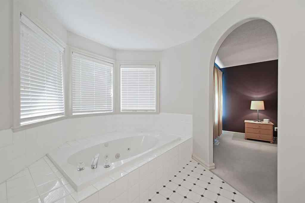 MLS® A2256672 - 41 Strathridge Crescent SW in Strathcona Park Calgary, Residential