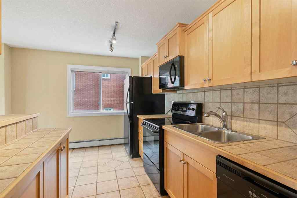 MLS® A2256685 - Unit #204 920 Royal Avenue SW in Lower Mount Royal Calgary, Residential