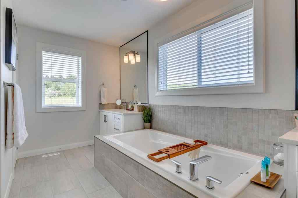 MLS® A2256688 - 64 Crestbrook View SW in Crestmont Calgary, Residential