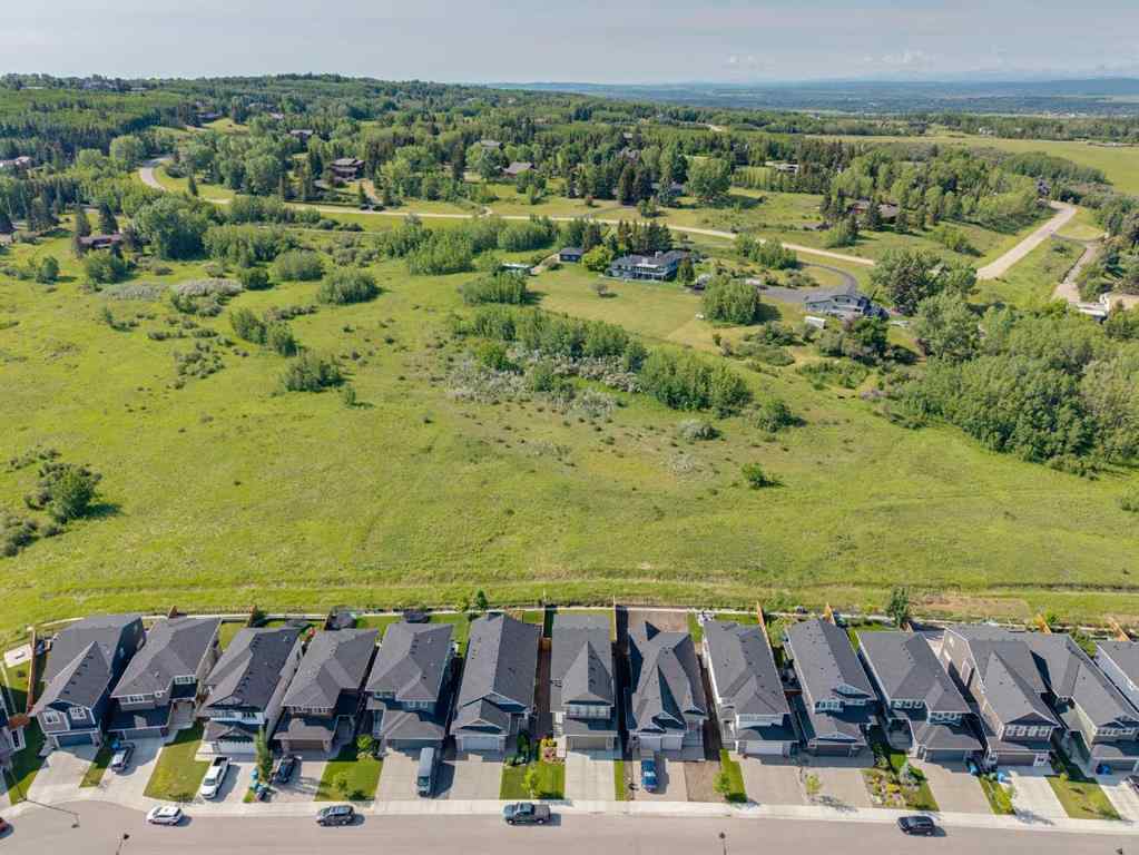 MLS® A2256688 - 64 Crestbrook View SW in Crestmont Calgary, Residential