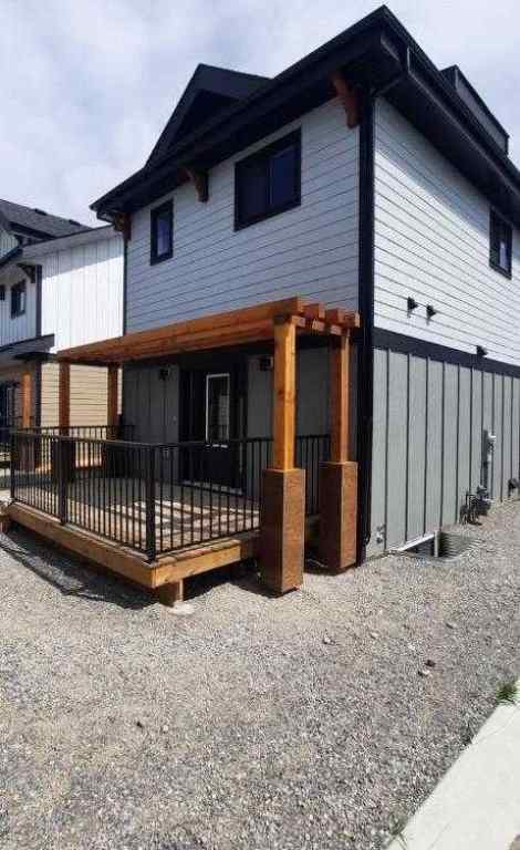 MLS® A2256699 - 22 Cottageclub Lane  in Cottage Club at Ghost Lake Rural Rocky View County, Residential