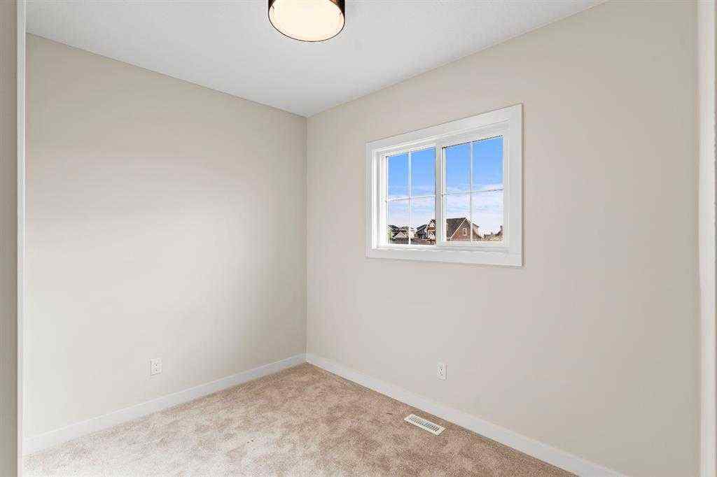 MLS® A2256699 - 22 Cottageclub Lane  in Cottage Club at Ghost Lake Rural Rocky View County, Residential