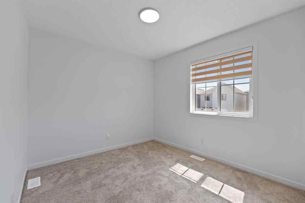 MLS® A2256727 - 55 Alpine Drive SW in Alpine Park Calgary, Residential