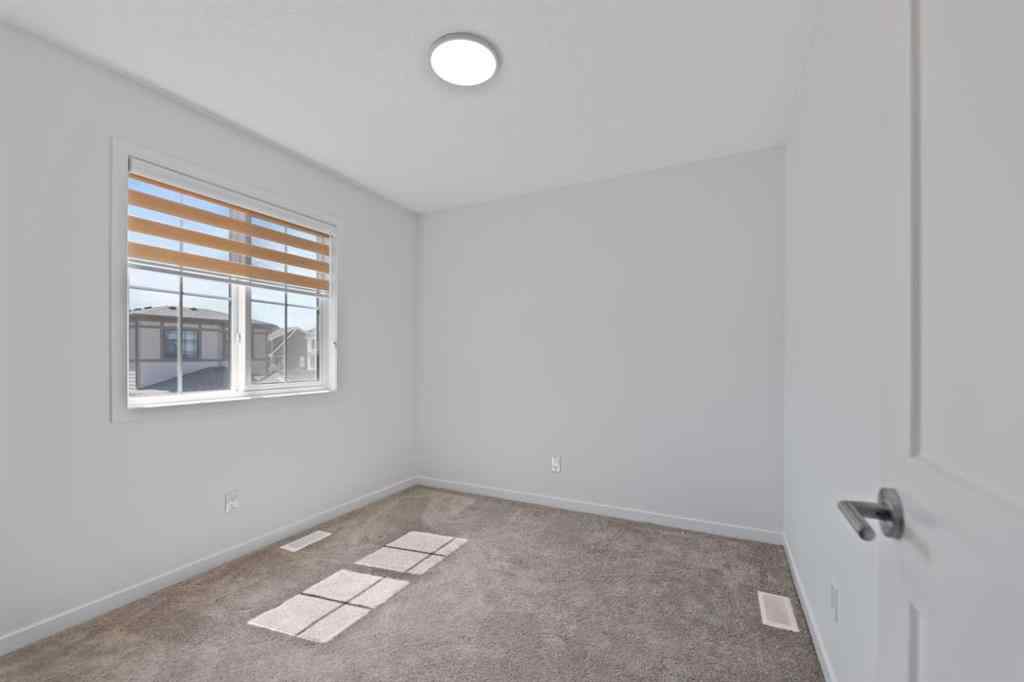 MLS® A2256727 - 55 Alpine Drive SW in Alpine Park Calgary, Residential