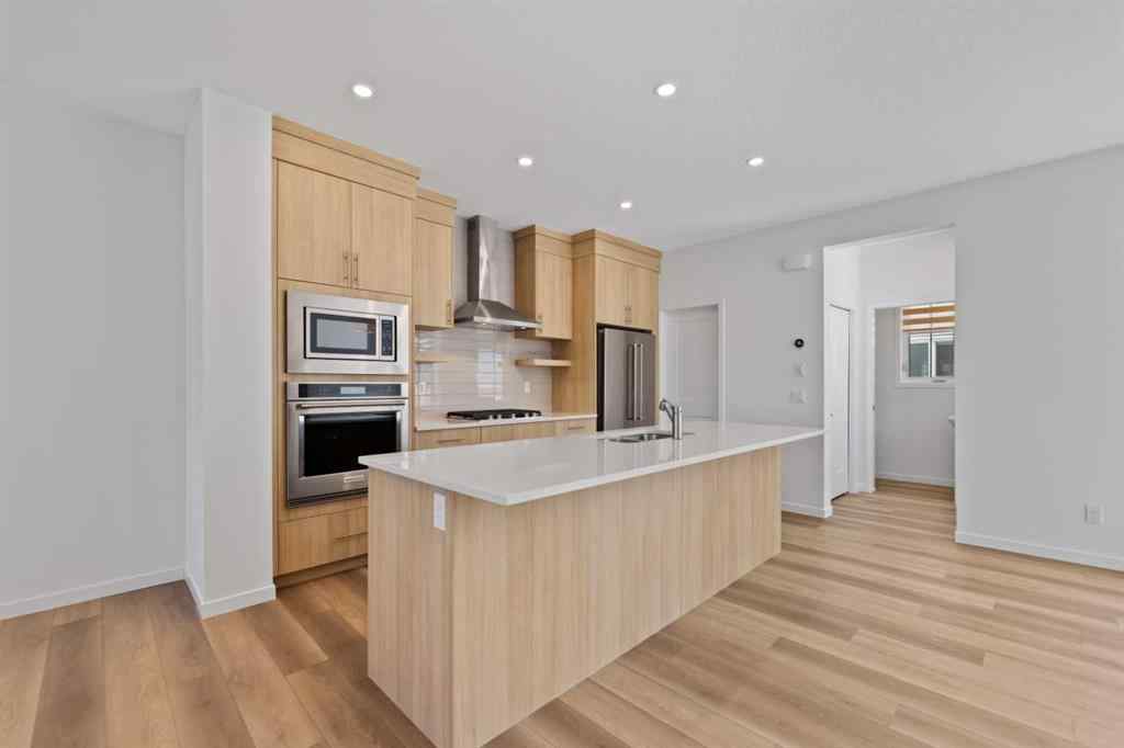 MLS® A2256727 - 55 Alpine Drive SW in Alpine Park Calgary, Residential