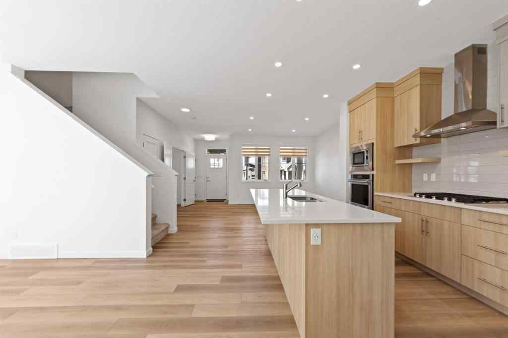 MLS® A2256727 - 55 Alpine Drive SW in Alpine Park Calgary, Residential