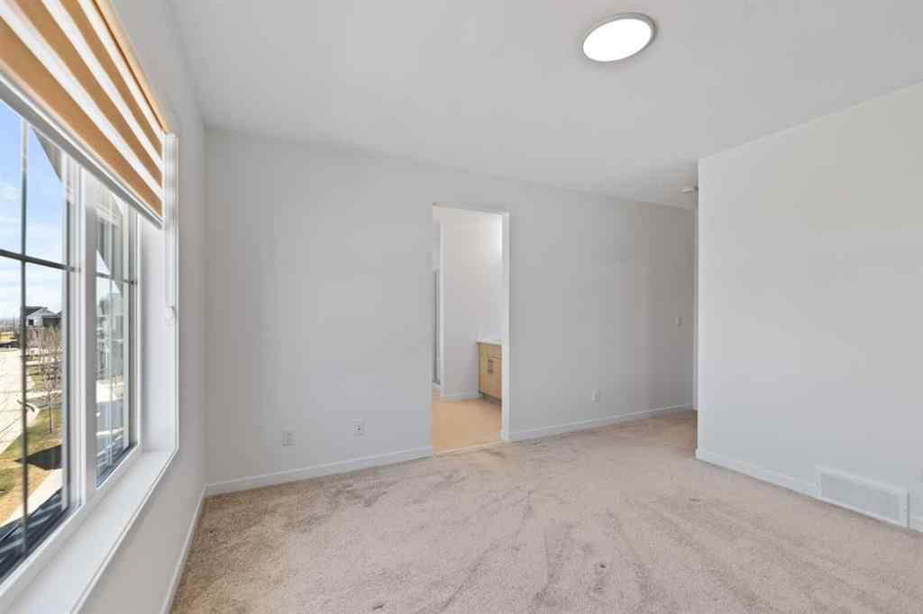MLS® A2256727 - 55 Alpine Drive SW in Alpine Park Calgary, Residential