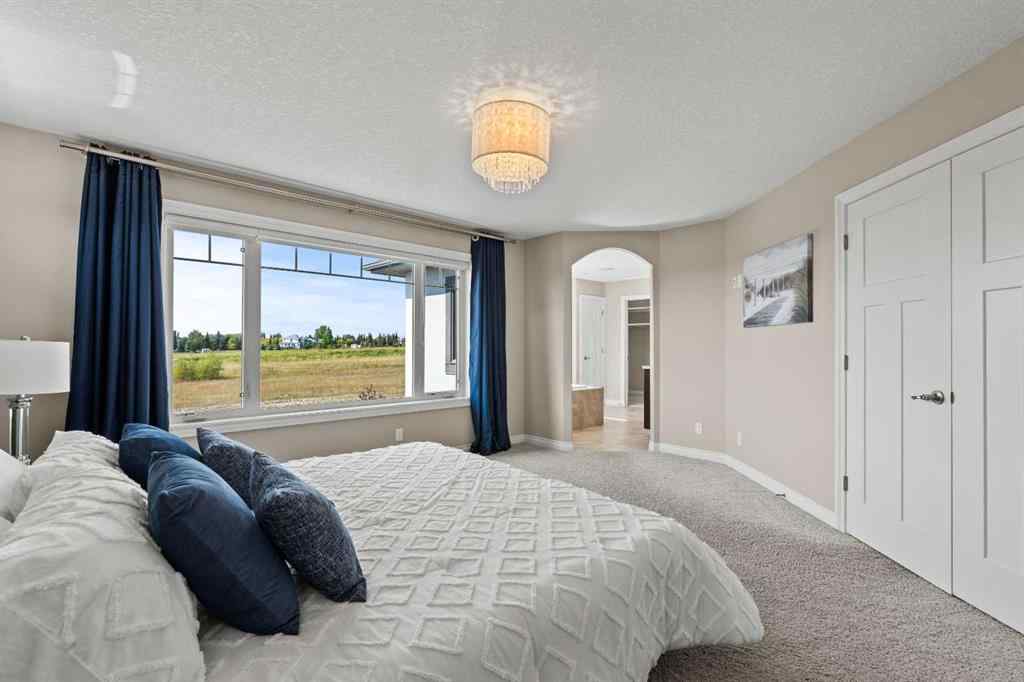 MLS® A2256733 - 102 Ranch Road  in Air Ranch Okotoks, Residential