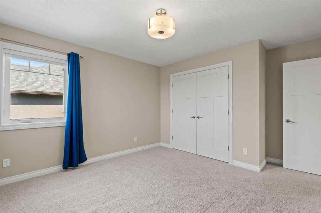 MLS® A2256733 - 102 Ranch Road  in Air Ranch Okotoks, Residential