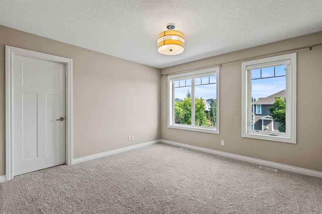 MLS® A2256733 - 102 Ranch Road  in Air Ranch Okotoks, Residential