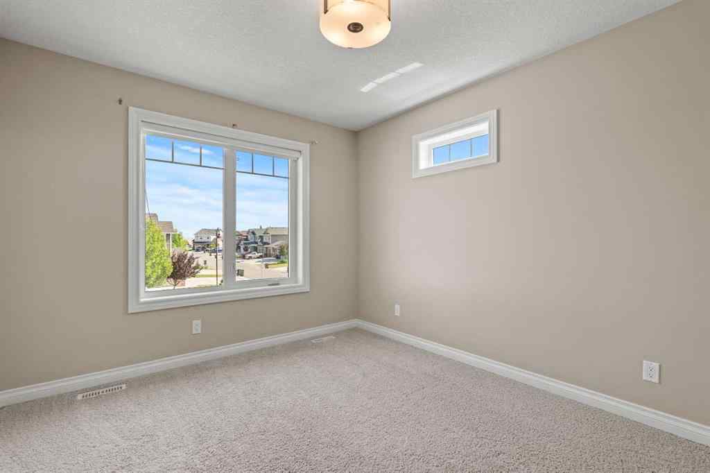 MLS® A2256733 - 102 Ranch Road  in Air Ranch Okotoks, Residential