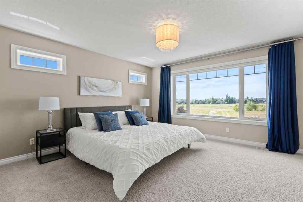 MLS® A2256733 - 102 Ranch Road  in Air Ranch Okotoks, Residential