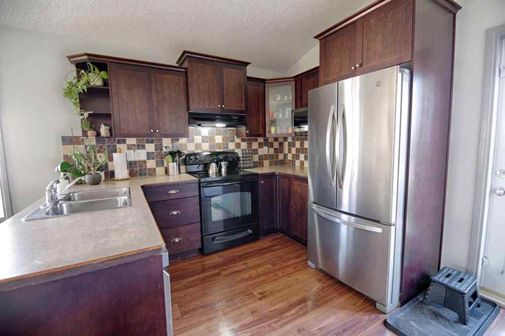 MLS® A2256744 - 212 Tartan Circle W in West Highlands Lethbridge, Residential