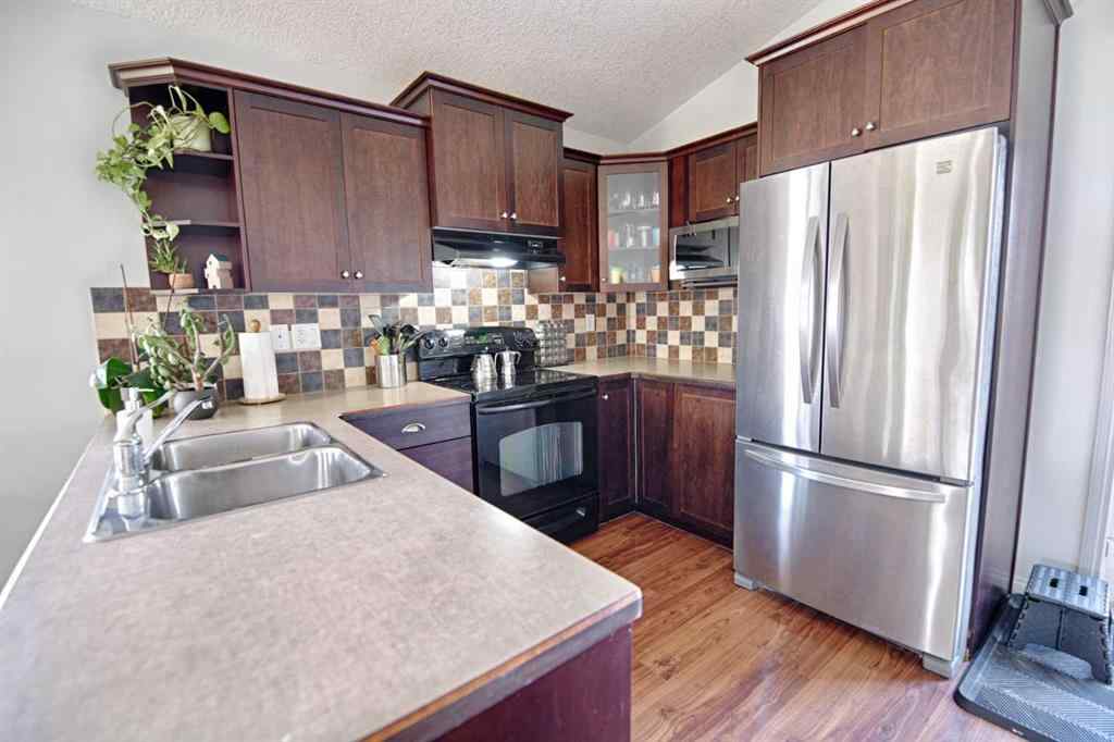 MLS® A2256744 - 212 Tartan Circle W in West Highlands Lethbridge, Residential