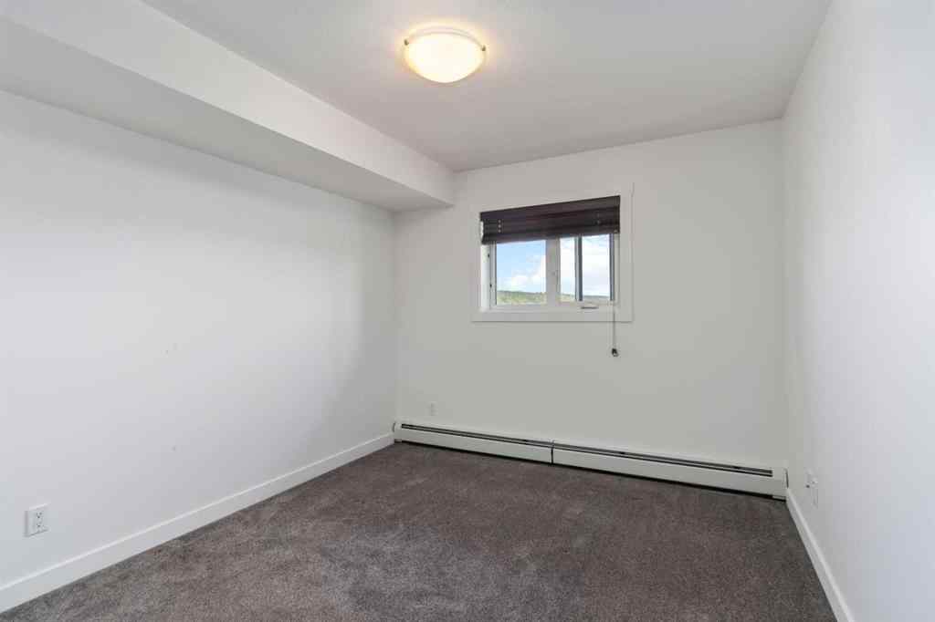 MLS® A2256778 - Unit #409 115 Denholm Gate  in Downtown Fort McMurray, Residential