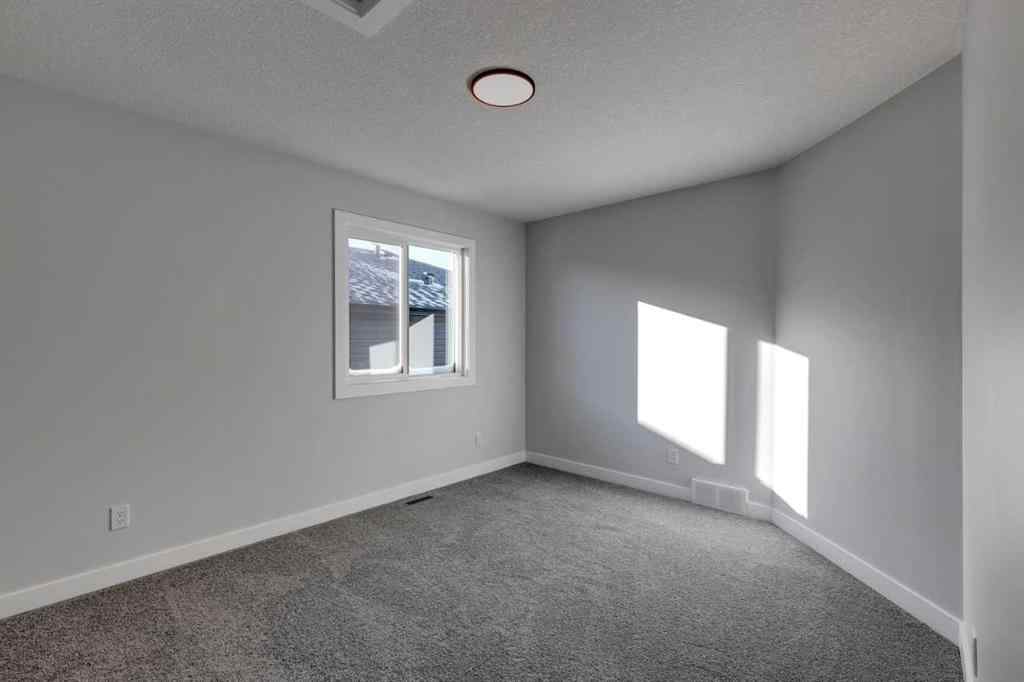 MLS® A2256791 - 180 Sora Terrace SE in Hotchkiss Calgary, Residential