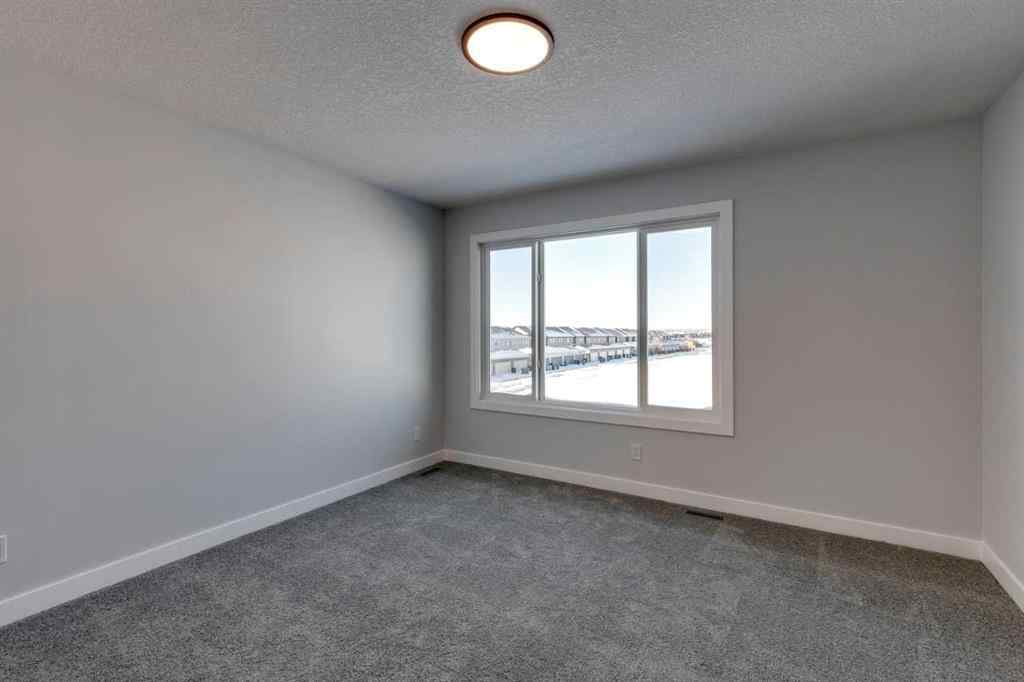 MLS® A2256791 - 180 Sora Terrace SE in Hotchkiss Calgary, Residential