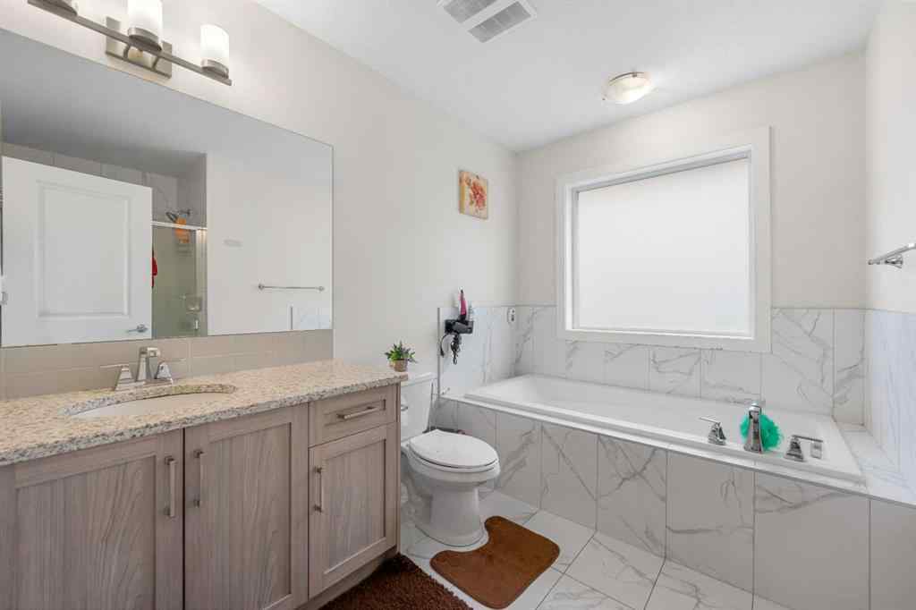 MLS® A2256818 - 235 Saddlestone Grove NE in Saddle Ridge Calgary, Residential