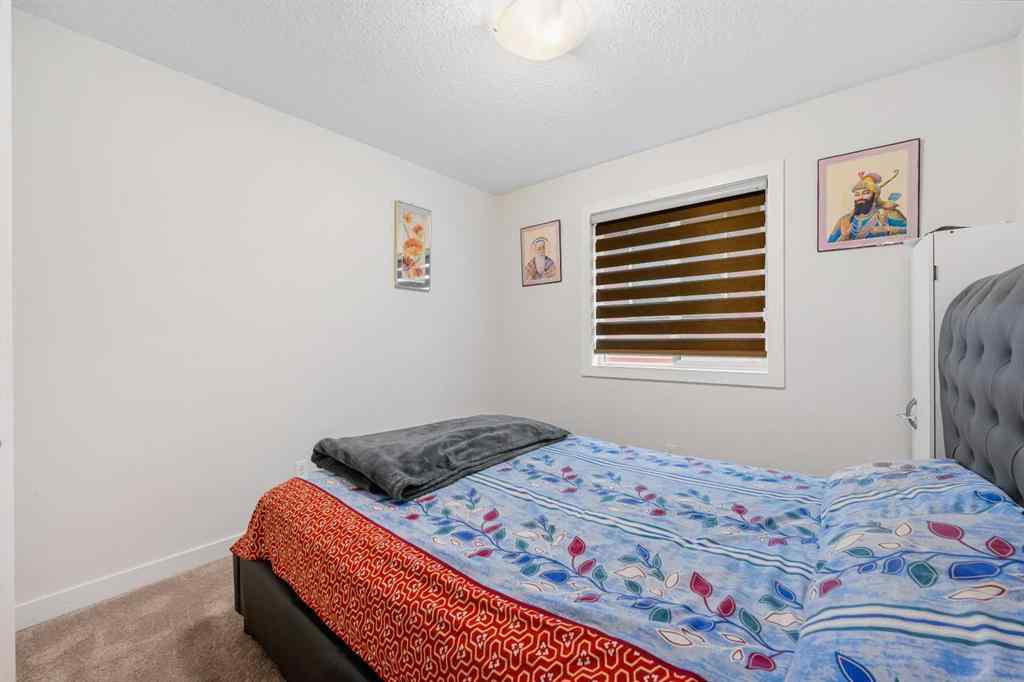 MLS® A2256818 - 235 Saddlestone Grove NE in Saddle Ridge Calgary, Residential