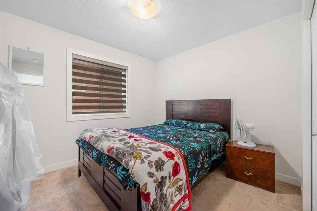 MLS® A2256818 - 235 Saddlestone Grove NE in Saddle Ridge Calgary, Residential