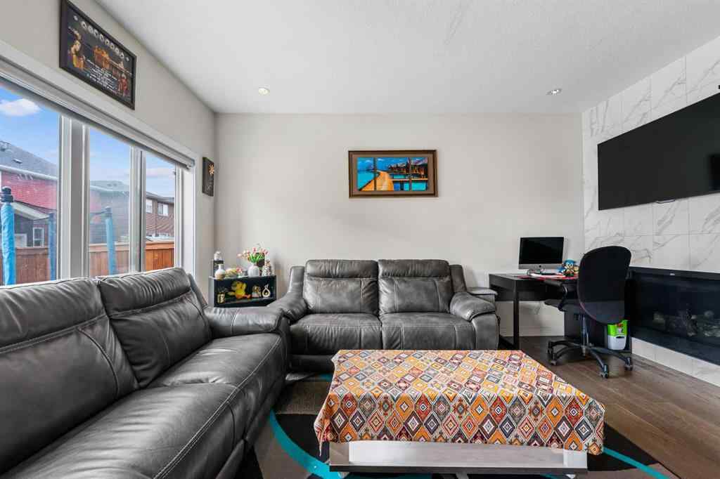 MLS® A2256818 - 235 Saddlestone Grove NE in Saddle Ridge Calgary, Residential