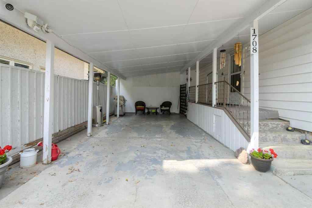 MLS® A2256819 - 1708 Lakeside Road S in Lakeview Lethbridge, Residential