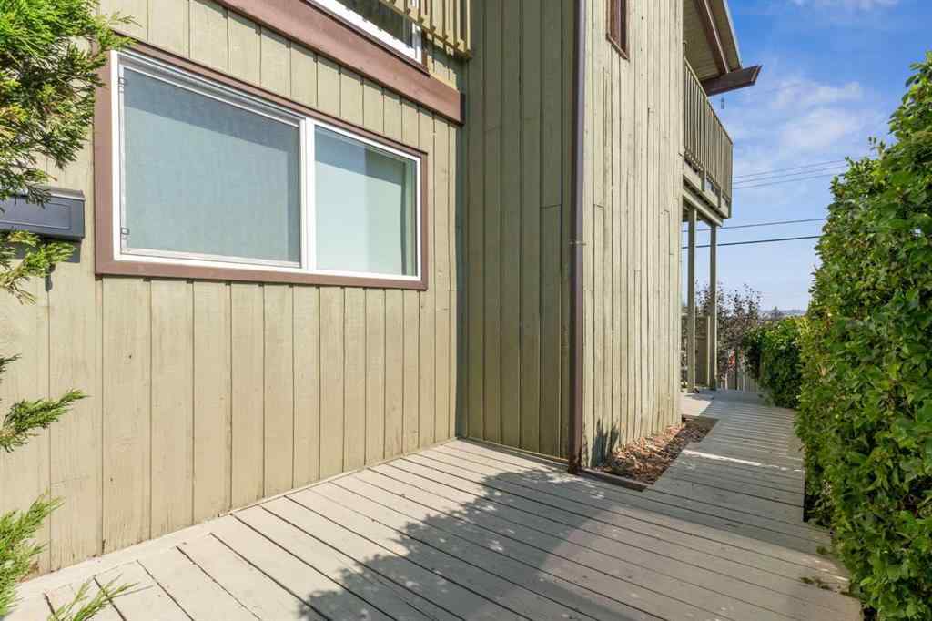 MLS® A2256834 - Unit #102 7416 Hunterview Drive NW in Huntington Hills Calgary, Residential