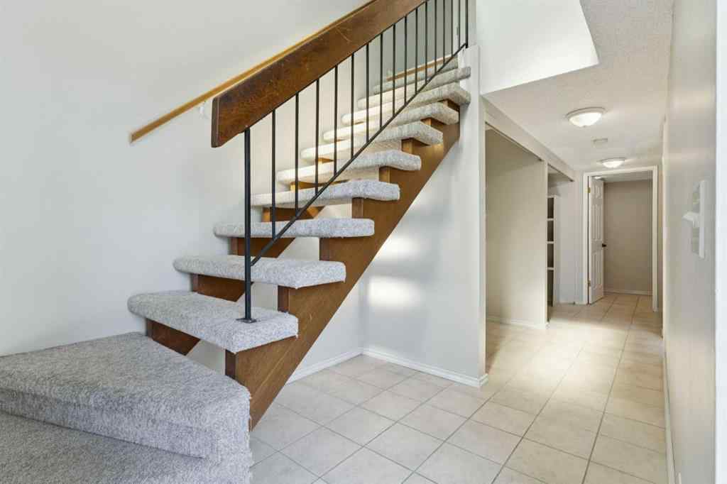 MLS® A2256834 - Unit #102 7416 Hunterview Drive NW in Huntington Hills Calgary, Residential