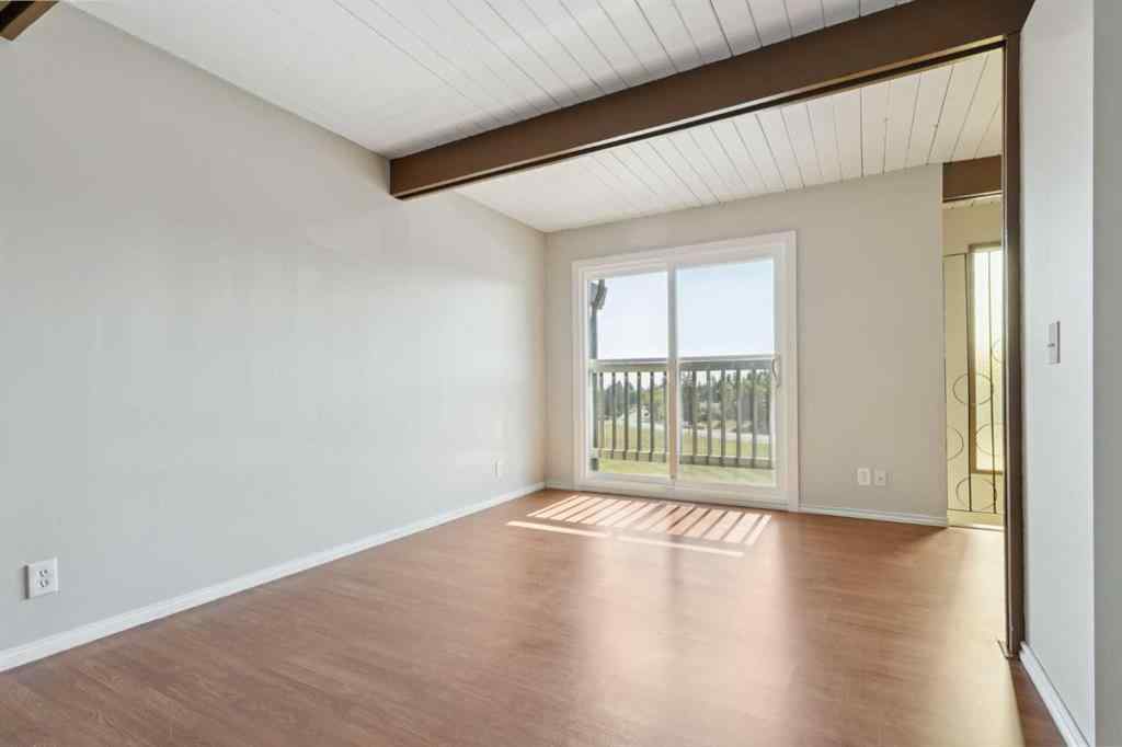 MLS® A2256834 - Unit #102 7416 Hunterview Drive NW in Huntington Hills Calgary, Residential