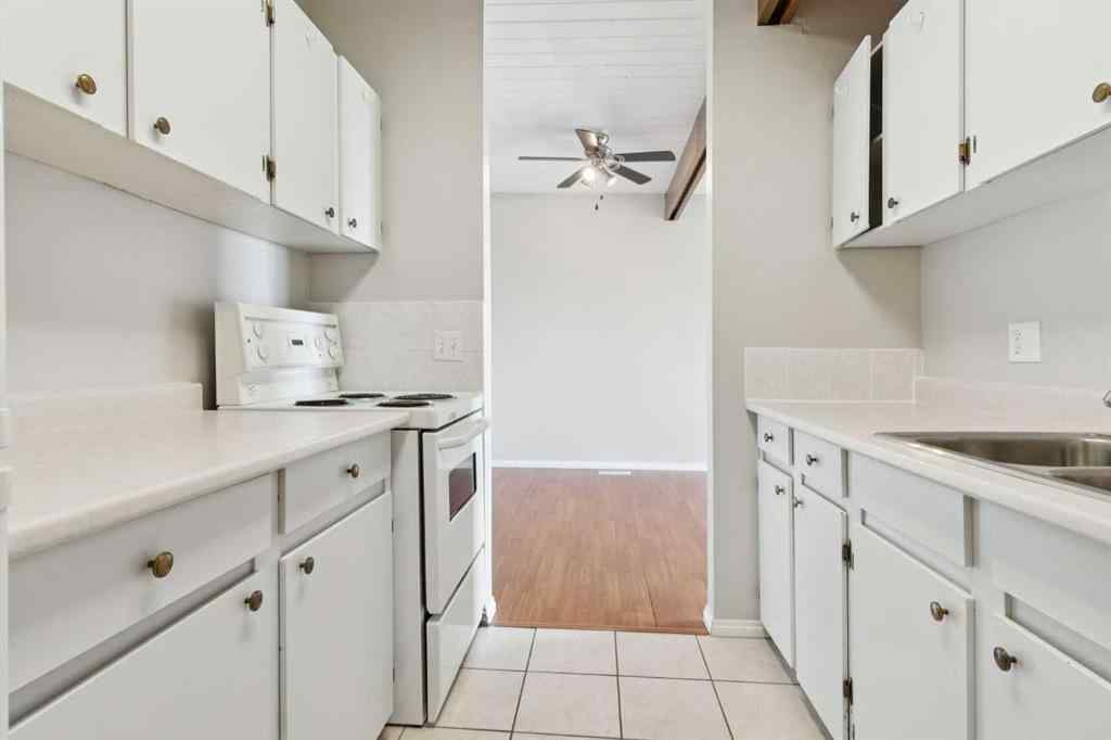 MLS® A2256834 - Unit #102 7416 Hunterview Drive NW in Huntington Hills Calgary, Residential