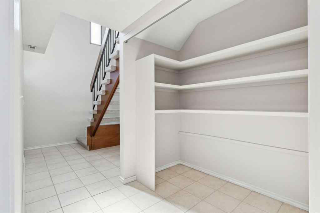 MLS® A2256834 - Unit #102 7416 Hunterview Drive NW in Huntington Hills Calgary, Residential