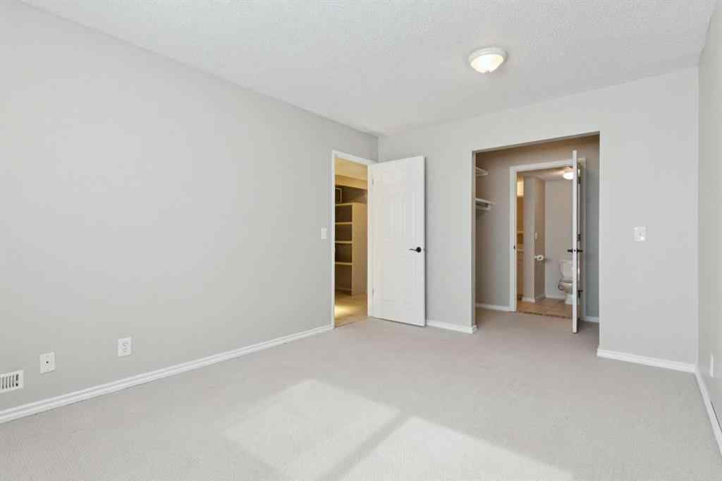 MLS® A2256834 - Unit #102 7416 Hunterview Drive NW in Huntington Hills Calgary, Residential