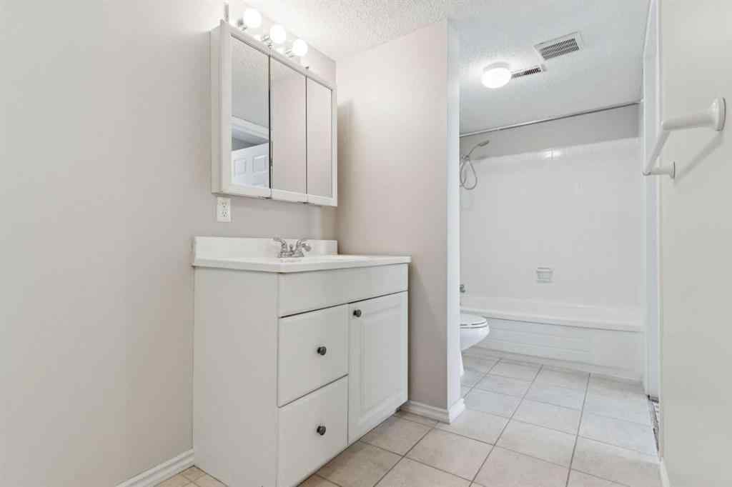 MLS® A2256834 - Unit #102 7416 Hunterview Drive NW in Huntington Hills Calgary, Residential