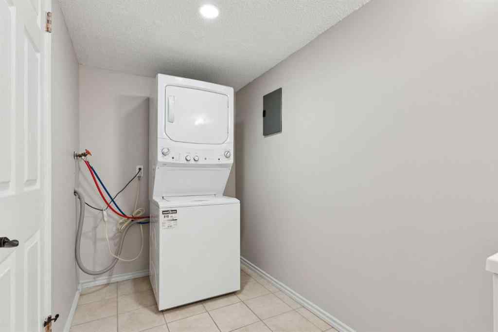 MLS® A2256834 - Unit #102 7416 Hunterview Drive NW in Huntington Hills Calgary, Residential