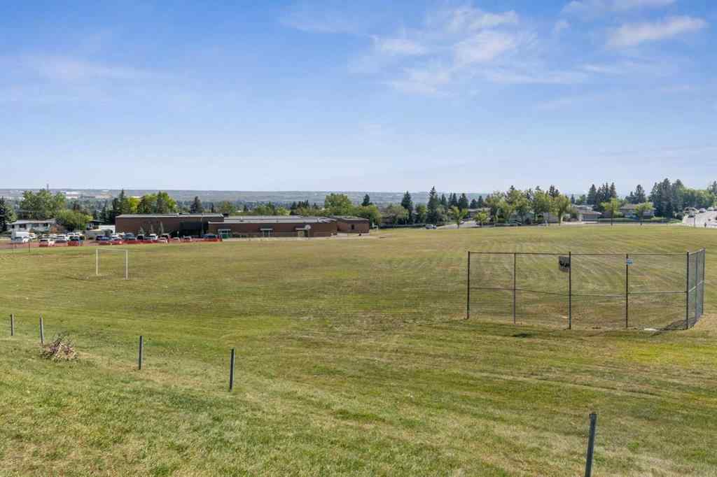 MLS® A2256834 - Unit #102 7416 Hunterview Drive NW in Huntington Hills Calgary, Residential