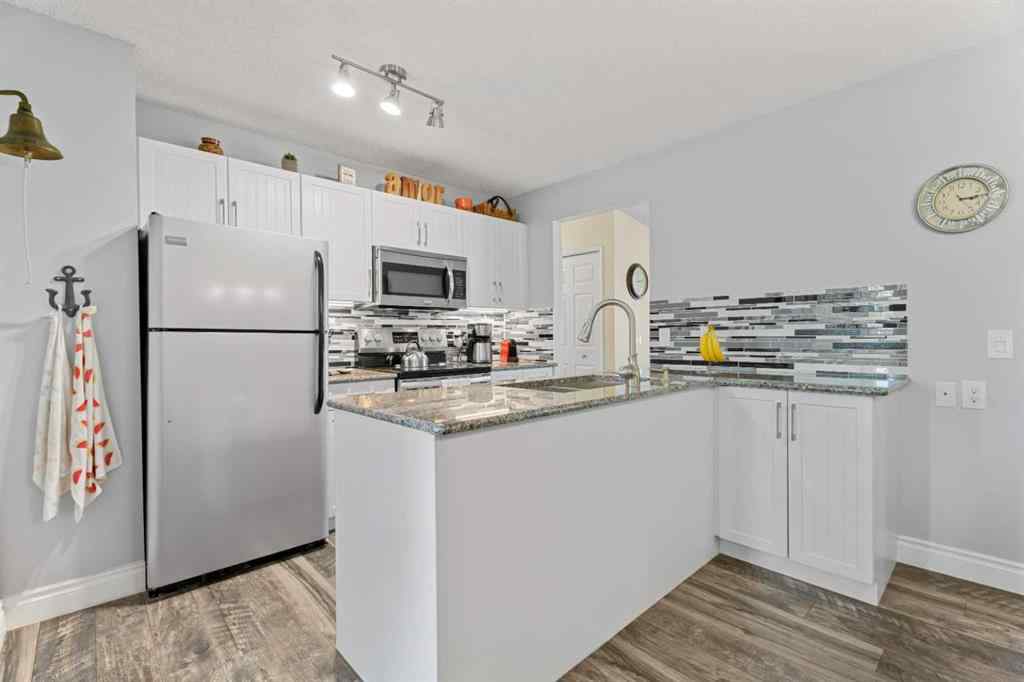 MLS® A2256876 - 1205 Meadowbrook Drive SE in Meadowbrook Airdrie, Residential