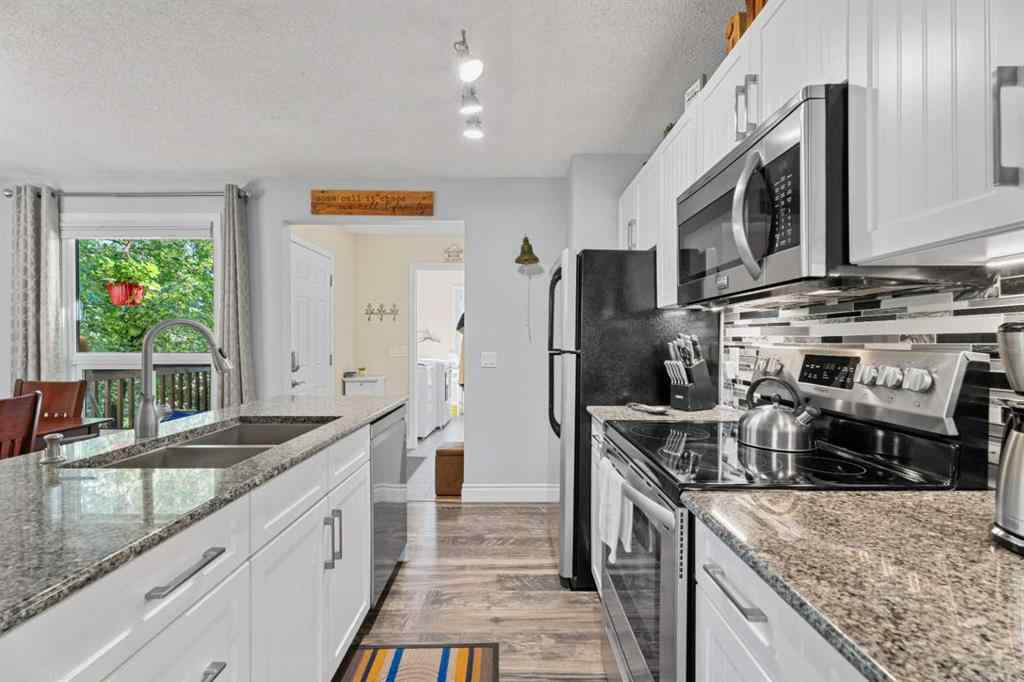 MLS® A2256876 - 1205 Meadowbrook Drive SE in Meadowbrook Airdrie, Residential